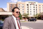 Kuldeep Sharma in front of his hotel in Brampton on the outskirts of Toronto