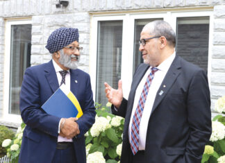 Surjit Babra with Toronto Metropolitan University president and vice-chancellor Mohamed Lachemi.